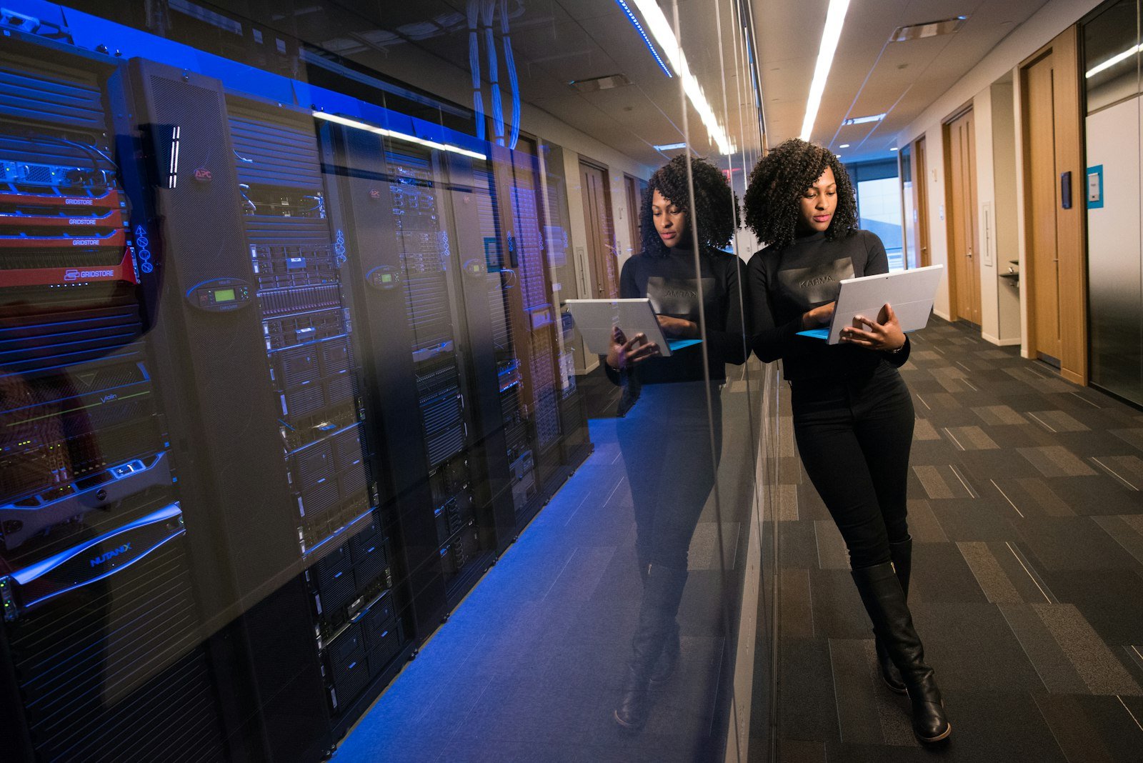 Young professional woman working in a modern technology facility