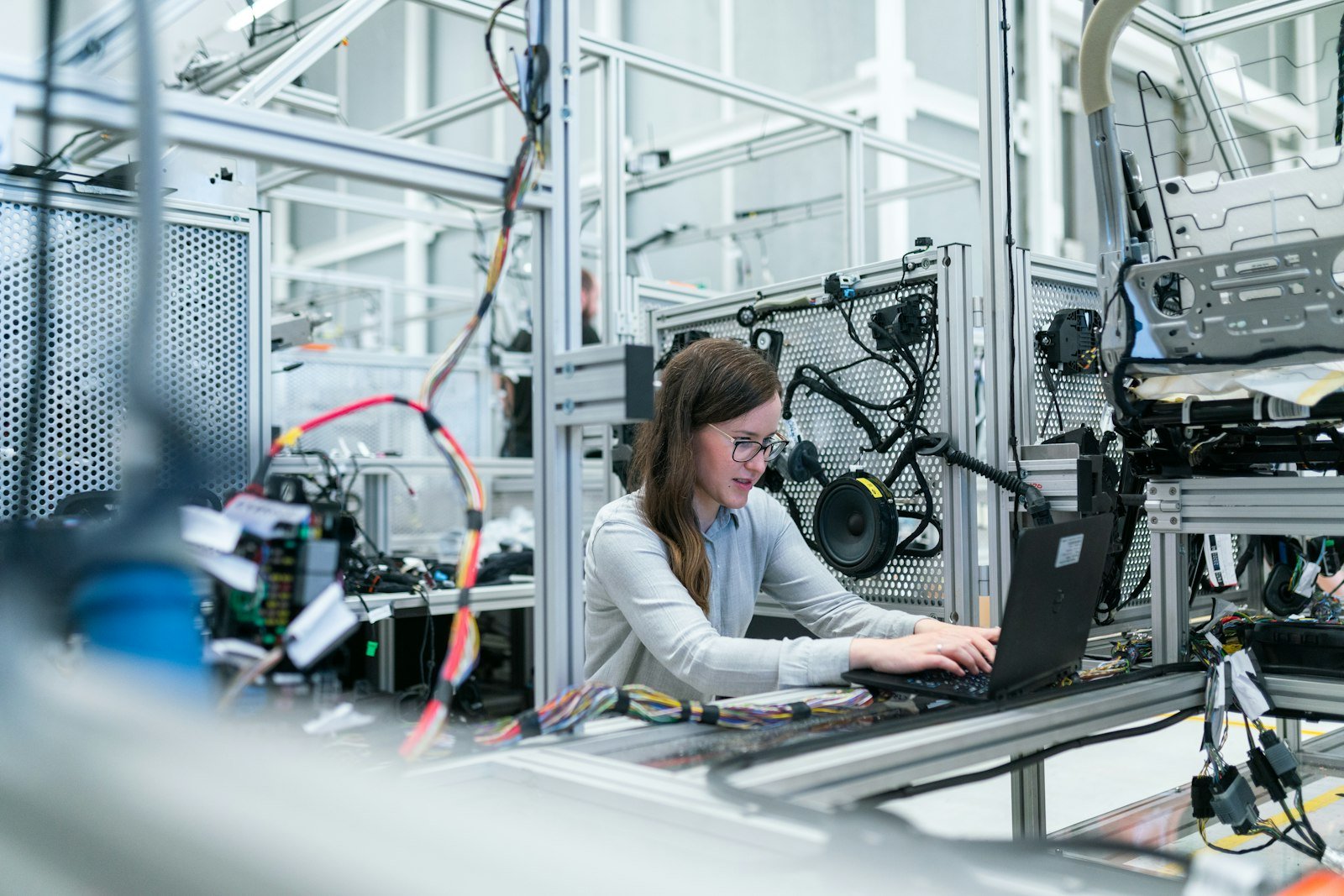 Engineer working on a prototype in a modern engineering lab